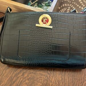 Sondra Roberts Faux leather purse with red lining